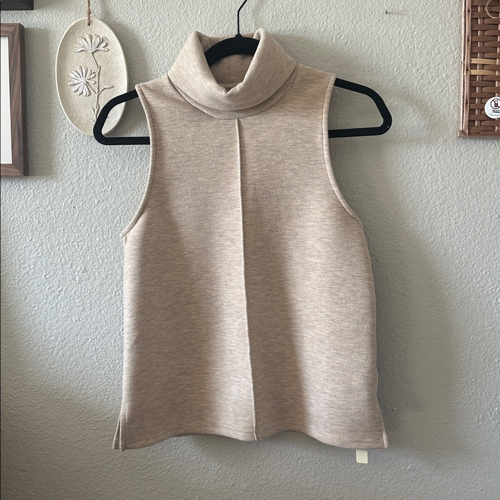 OGL Sleeveless Cream Turtleneck Sweater